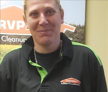 Chelsea Linkowich, Tech for SERVPRO Sparrows / Point / Essex / Chase is posing in the office for work portrait in Rosedale